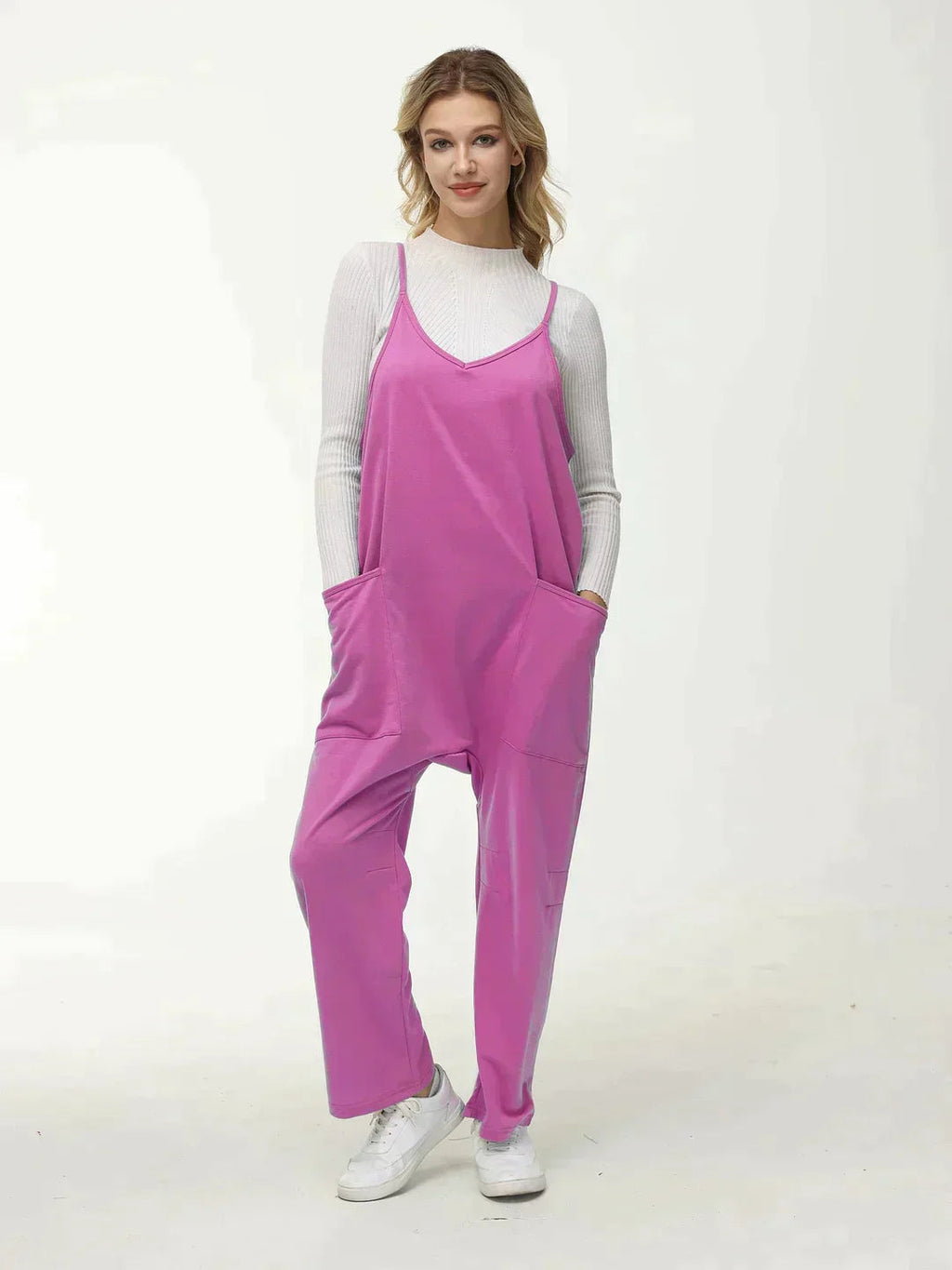 Jumpsuit til kvinder med brede stropper og vide ben